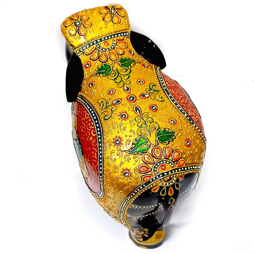 A hand-painted wooden elephant statue, a stunning and unique gift idea.