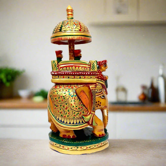 A hand-painted wooden Maharaja elephant statue, a true work of art showing the luxury of kings.