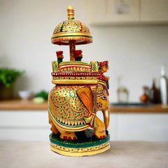 A hand-painted wooden Maharaja elephant statue, a true work of art showing the luxury of kings.