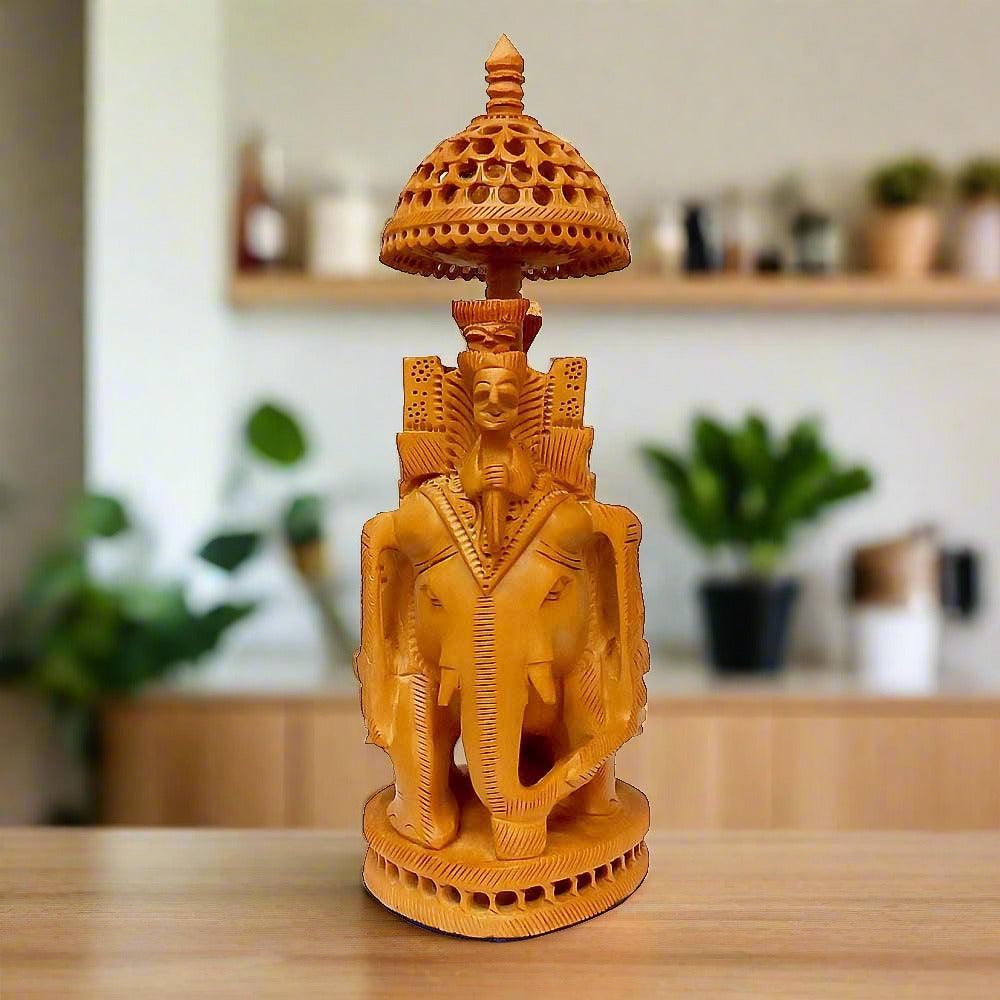 A handcrafted Ambari elephant showpiece created by a skilled artist from Jaipur.