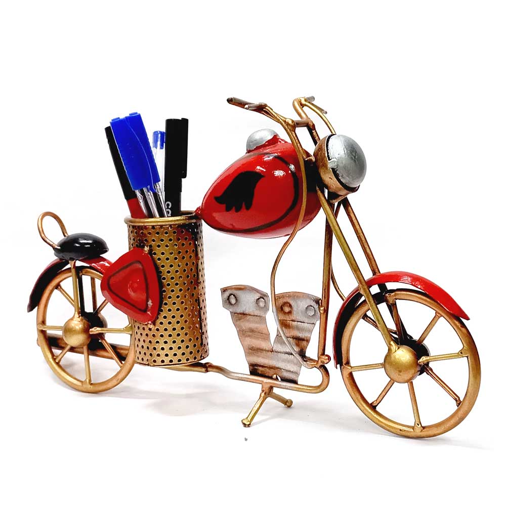 A handcrafted Bullet bike showpiece that functions as a pen holder, a stylish piece of table decor.