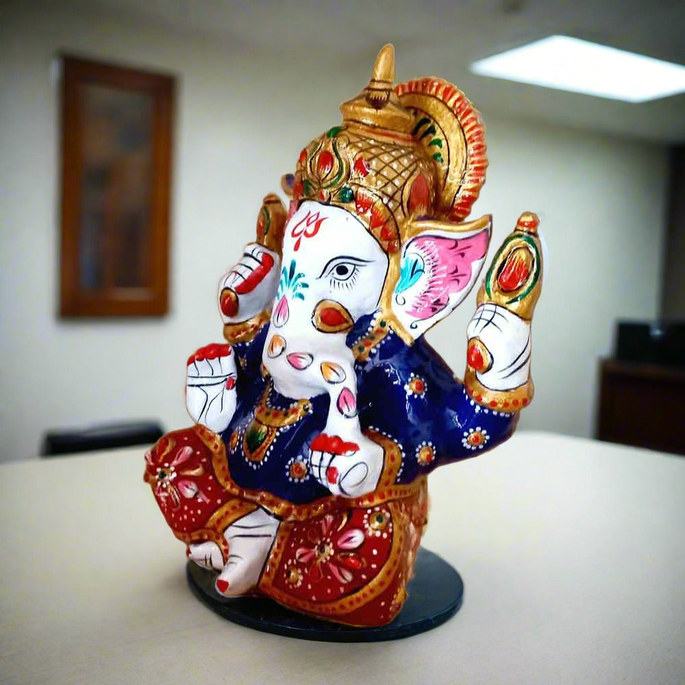 Intricately designed meenakari Ganesha idol, remover of obstacles