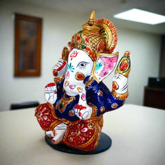 Intricately designed meenakari Ganesha idol, remover of obstacles