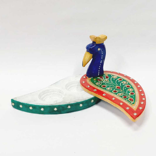 Handcrafted marble Chopra Kumkum holder with intricate artwork.
