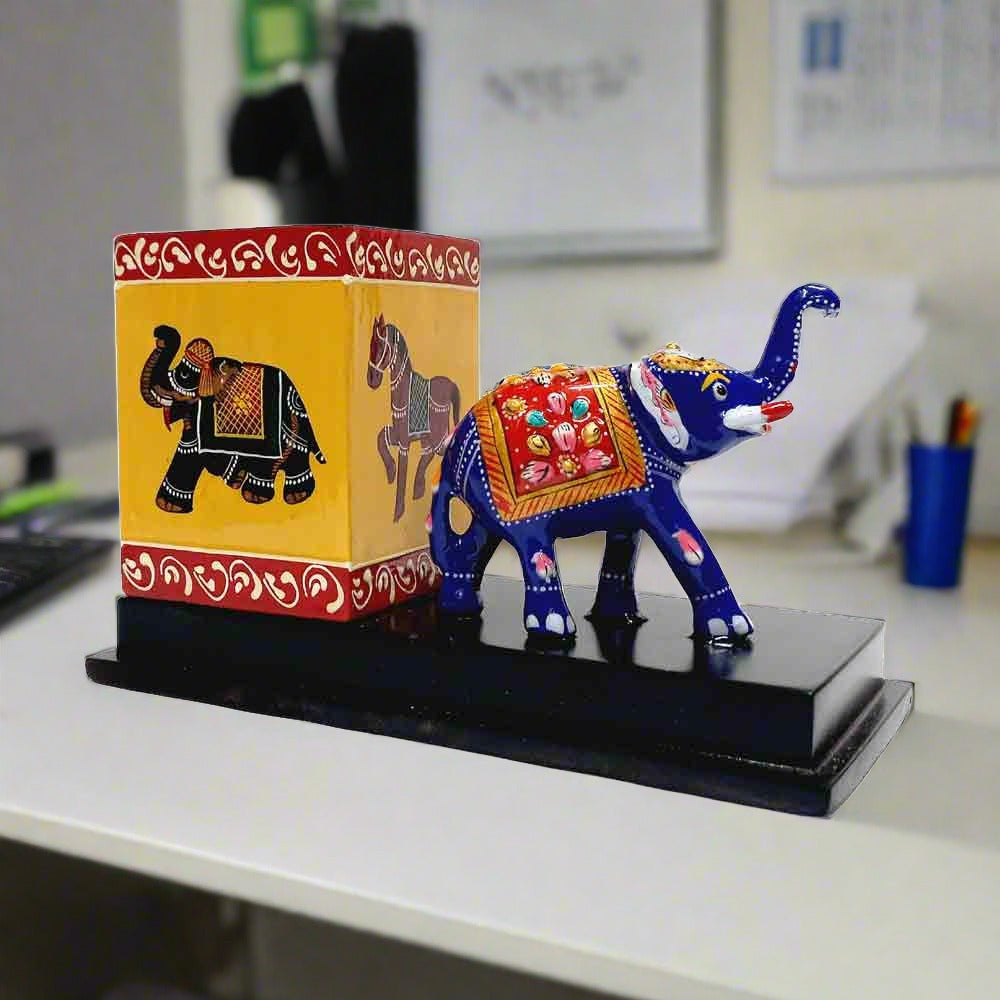 A handmade elephant desk organizer, perfect for holding pens and pencils.