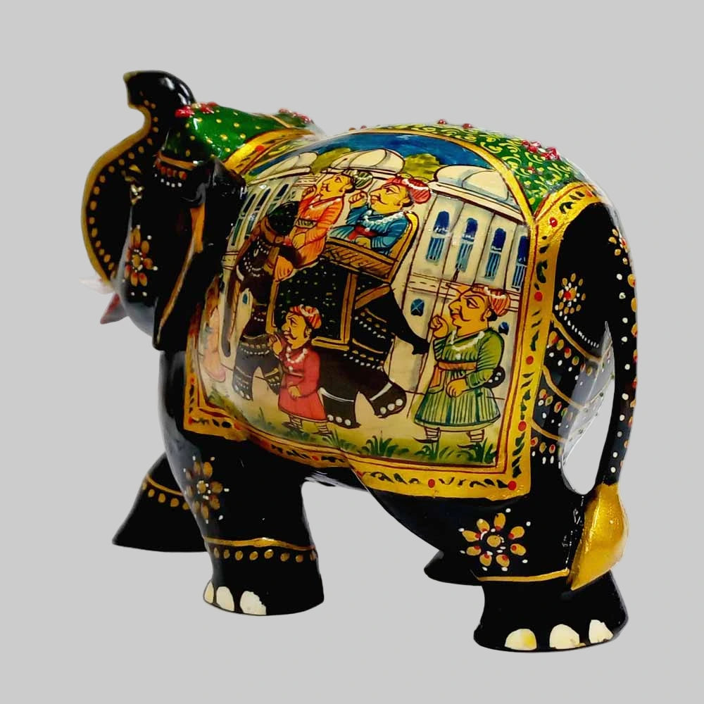 Handcrafted wooden elephant idol featuring detailed Mughal-style miniature painting