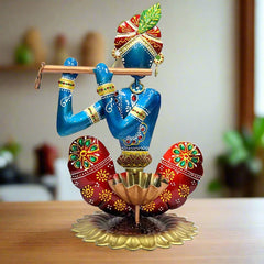 A handcrafted, multicolor Krishna tealight holder, perfect for home decor.