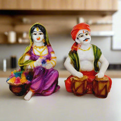 Decorative Rajasthani couple statues, handcrafted with intricate painting details