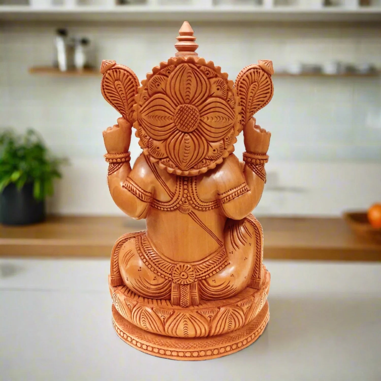 Handcrafted wooden Lotus Ganesh idol, perfect for pooja room and decor.