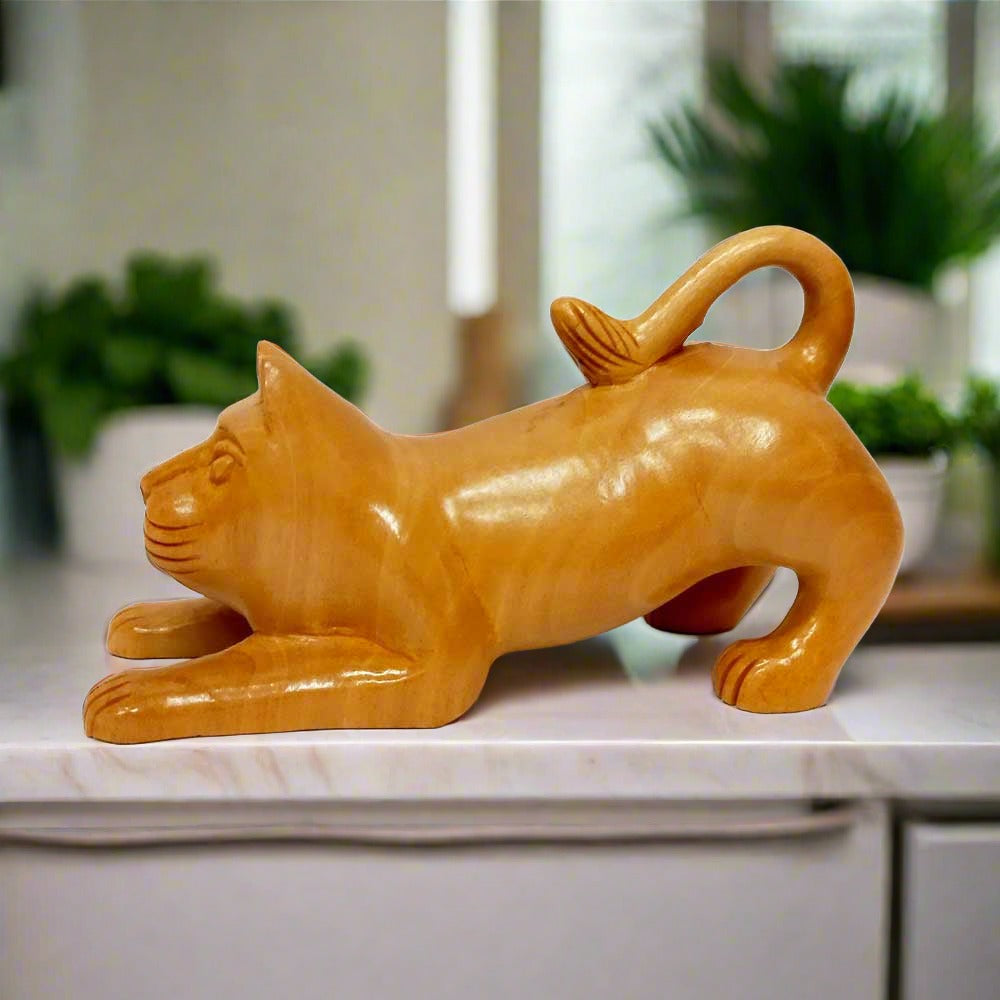 A handcrafted wooden cat figurine, a unique gift for cat lovers.