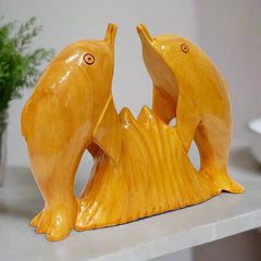 Handcrafted wooden dolphin fish showpiece for home decor and gifting.