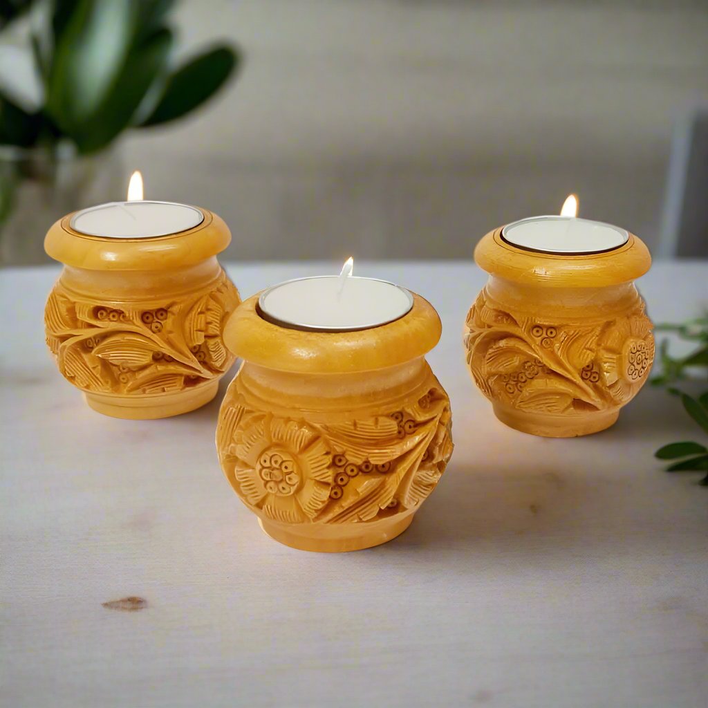 Elegant wooden tealight holder with intricate carved design