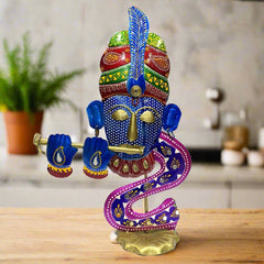 A handmade metal Krishna showpiece with a unique and beautiful design and texture.