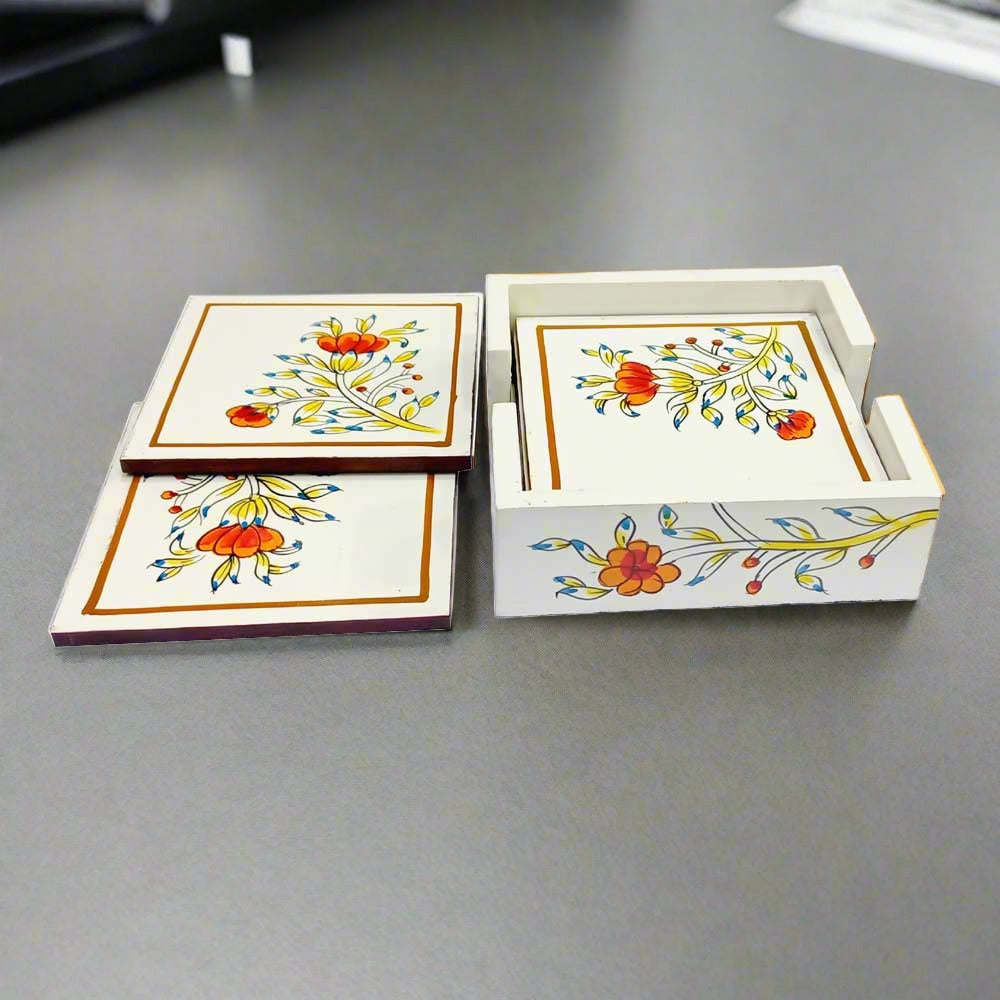 A completely handmade wooden coaster set with 6 plates and a holder.