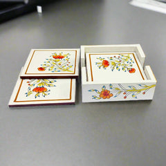 A completely handmade wooden coaster set with 6 plates and a holder.