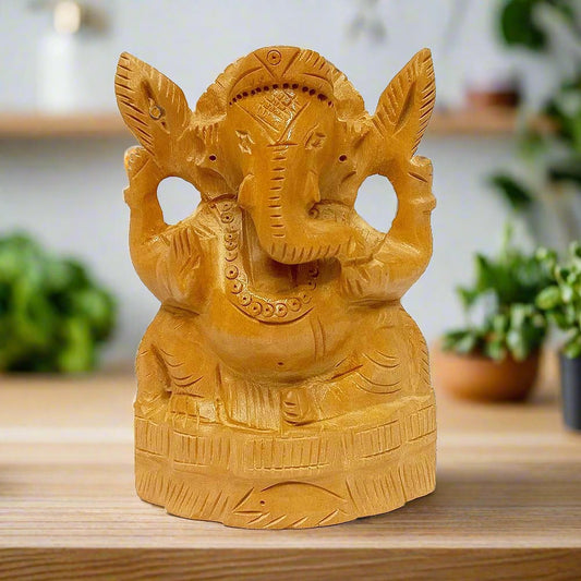 Handmade wooden Ganpati idol with fine carving, ideal for worship