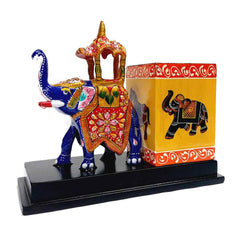 An Indian Ambabari elephant pen pot, perfect as a souvenir or a decorative piece.