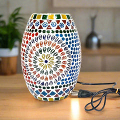 An intricate mosaic glass table light, providing beautiful ambient lighting.