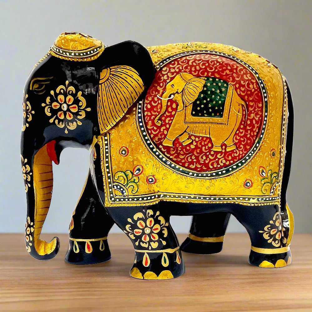 An intricate wooden elephant art piece, a captivating element for home or office decor.