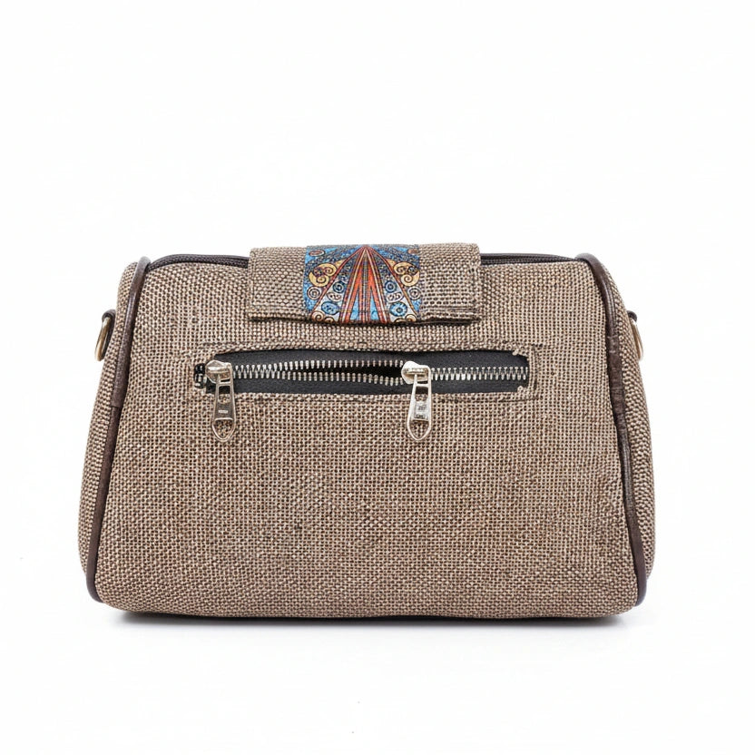 Rear view showing the secure back side zip pocket on a jacquard printed bag