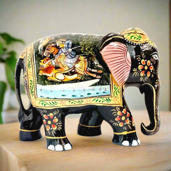 Kadamba wood elephant with handmade black paint and Mughal artwork on stomach, classic home decor piece