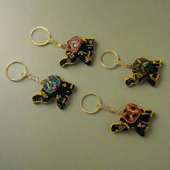 Handcrafted Lac Elephant keychains set of 4 in assorted colors, traditional Indian design