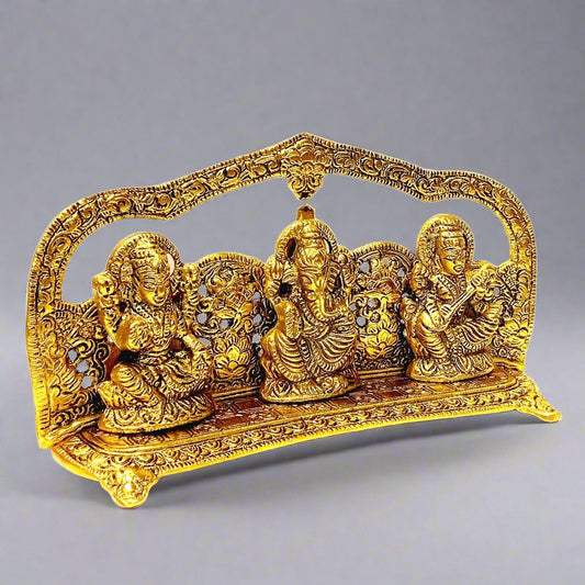 A beautiful Lakshmi, Ganesh, and Saraswati showpiece, a perfect Diwali gift.