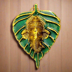 Beautifully designed metal leaf Ganesha wall art for home decoration.