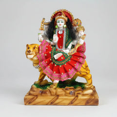 Maa Durga idol riding on a lion, made of resin with multicolor painting and red stone work.