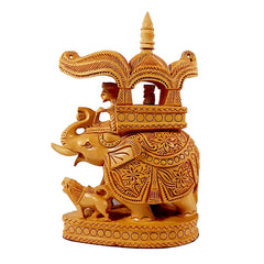 A majestic wooden elephant figurine, a perfect addition to office decor as a symbol of power and prosperity.