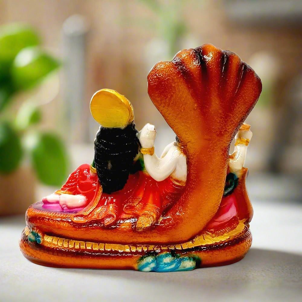 Marble dust Vishnu Lakshmi statue with intricate carvings and painting.