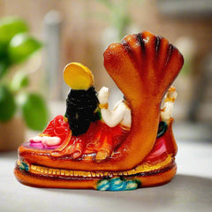 Marble dust Vishnu Lakshmi statue with intricate carvings and painting.