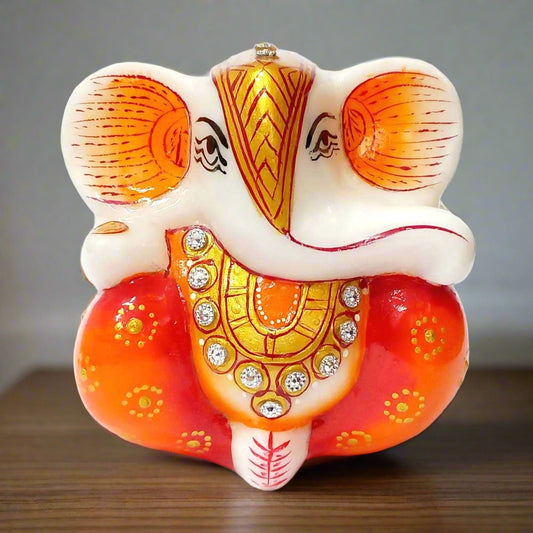 Handmade Italian marble Ganesh idol with golden, orange and red painting