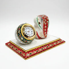 Marble Ganesh statue with round ball clock on a rectangular platform, hand-painted in multicolor.
