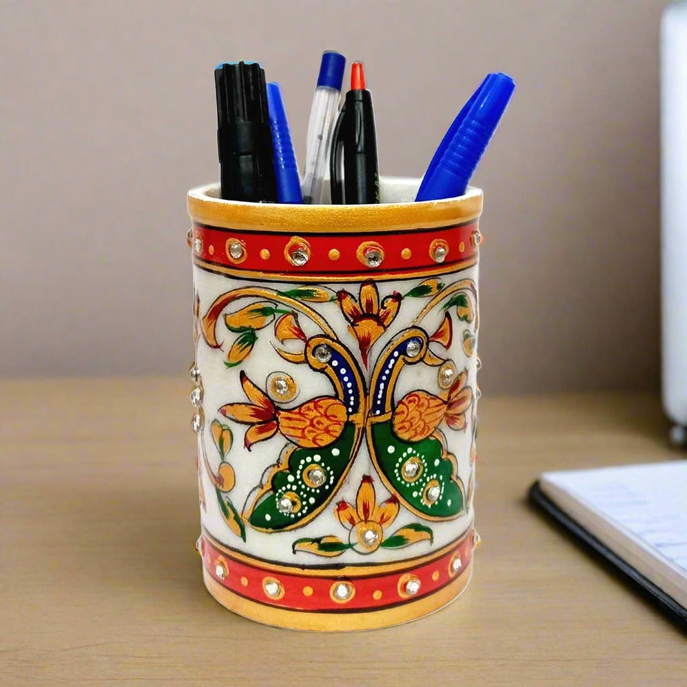 A beautiful multi-color marble pen holder with a unique embossed hand-painted design.