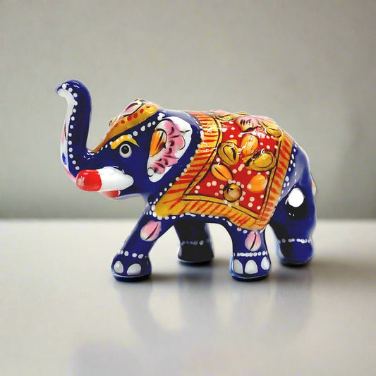 Handmade Meenakari baby elephant figurine with colorful enamel painting.
