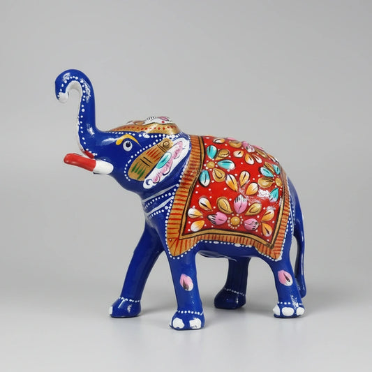 Handcrafted blue metal Meenakari elephant idol with raised trunk for home and office decor.