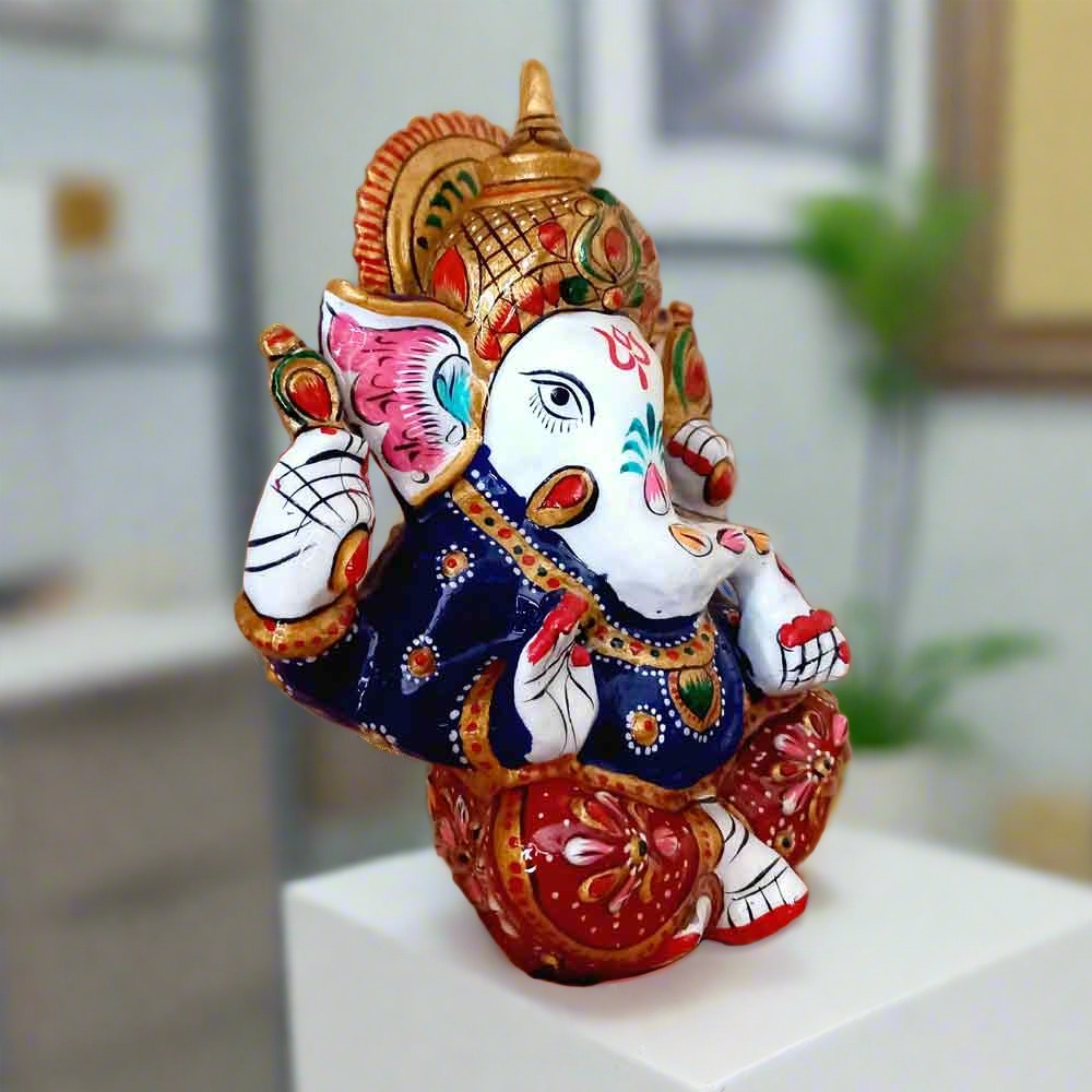 Colorful metal Ganesha statue symbolizing positivity and success