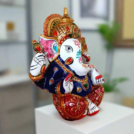 Colorful metal Ganesha statue symbolizing positivity and success