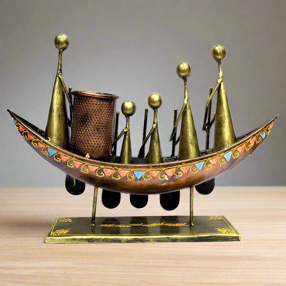 A stunning metal boat and tribal art desk organizer, a perfect blend of decor and utility.