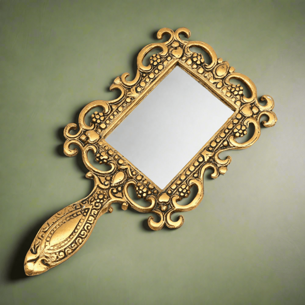 Antique metal hand mirror with oxidized golden polish, handcrafted vanity accessory