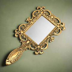 Antique metal hand mirror with oxidized golden polish, handcrafted vanity accessory