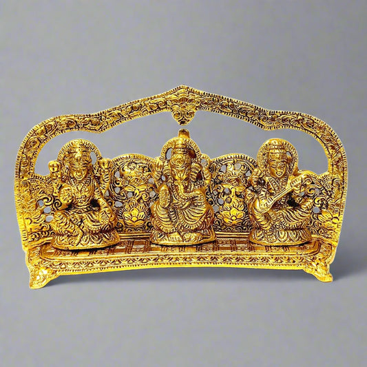 A beautiful metal idol of Lakshmi, Ganesh, and Saraswati with a long-lasting golden oxidized polish.