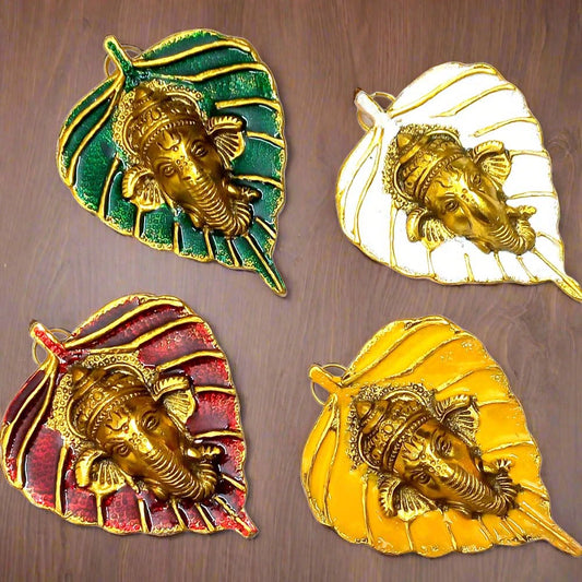 Metal leaf Ganesha wall hanging with enamel painting and golden polish.