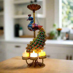 Hand-painted metal peacock showpiece with four tealight holders, vibrant decorative design, ideal for festive and home décor.