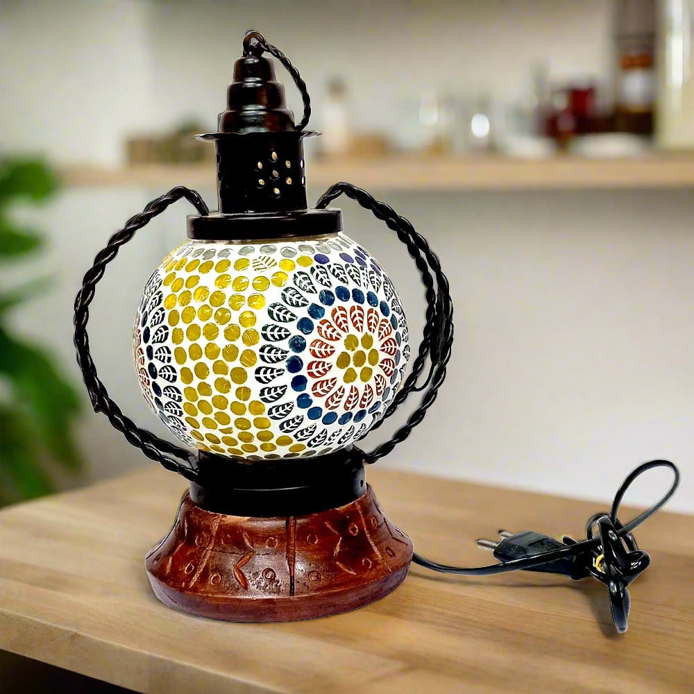A decorative mosaic table lamp with multiple lights and an assorted design.