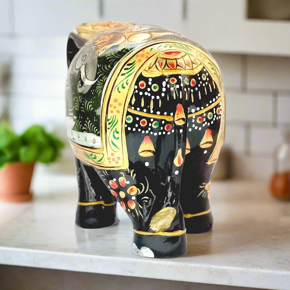Wooden elephant statue with exquisite Mughal paintings on stomach, ideal decorative item for homes
