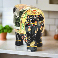 Wooden elephant statue with exquisite Mughal paintings on stomach, ideal decorative item for homes