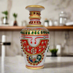 A multi-colored marble flower pot, a stunning showpiece for any room.