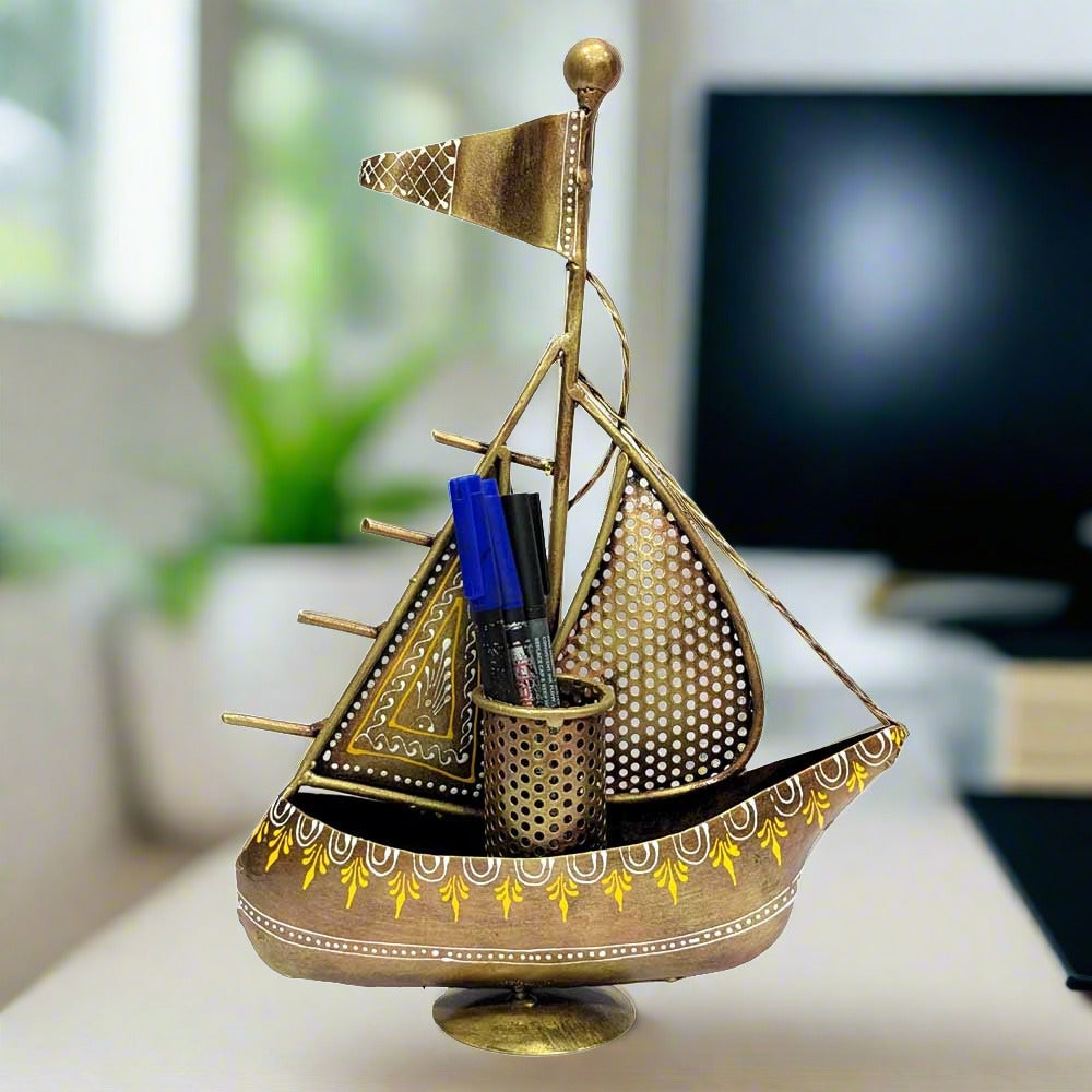 A metal pen stand with a boat design, a perfect addition to your office desk that will grab everyone's attention.